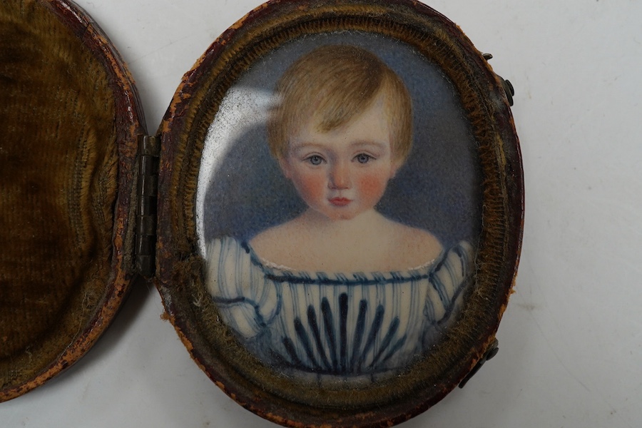 A Regency portrait miniature on ivory of a boy, oval, 4.6 X 3.7 cm, good condition, in a contemporary Morocco leather case. CITES Submission reference 51NJDFHW. Condition - worn